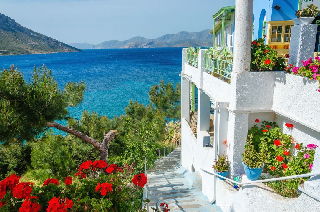 bigstock-Greek-studio-with-flowers-and--90323594_result