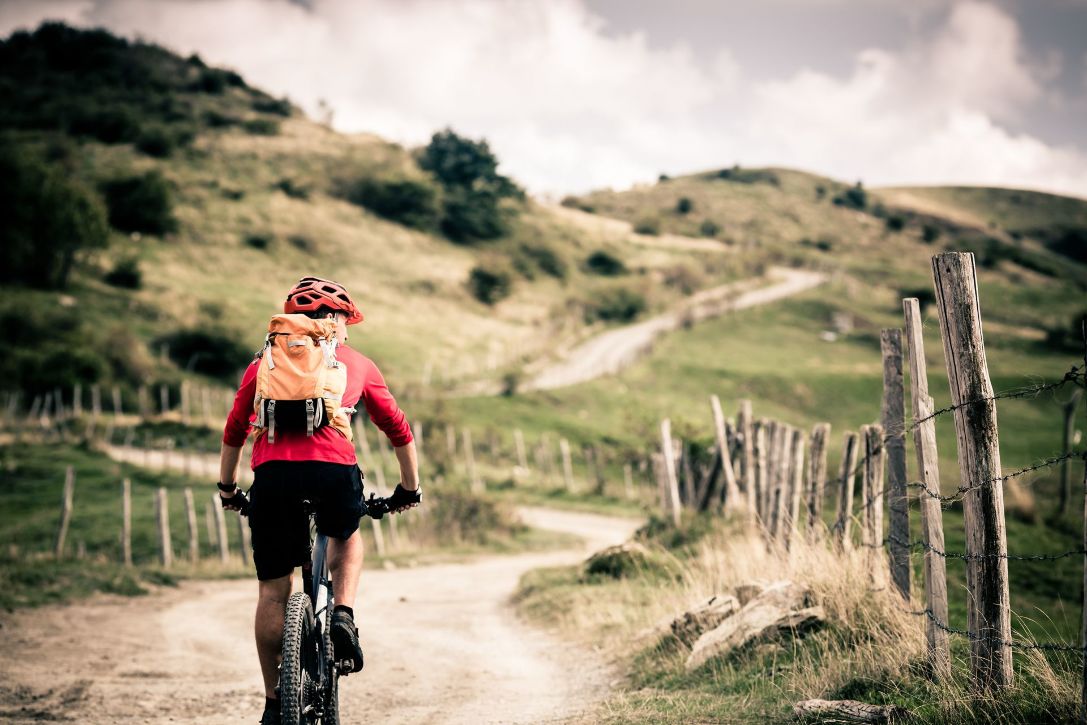 bigstock-Mountain-Bike-Rider-On-Country-106342292_result