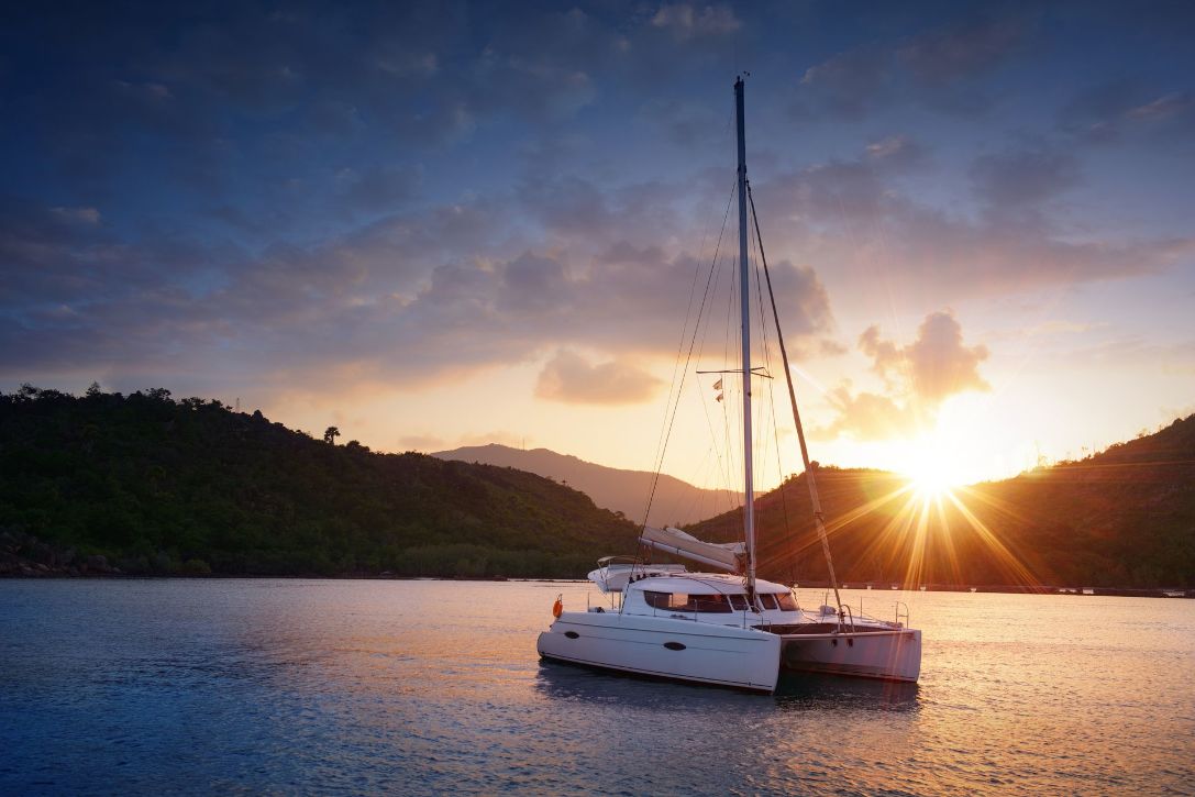 bigstock-Yacht--Catamaran-in-the-tropi-129668618_result